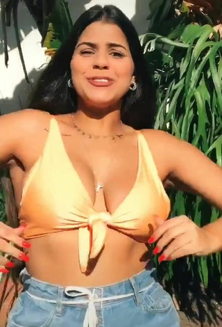 2. Hottest Julia Antunes Shows Cleavage in Yellow Bikini Top