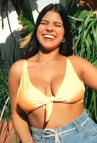 3. Hottest Julia Antunes Shows Cleavage in Yellow Bikini Top