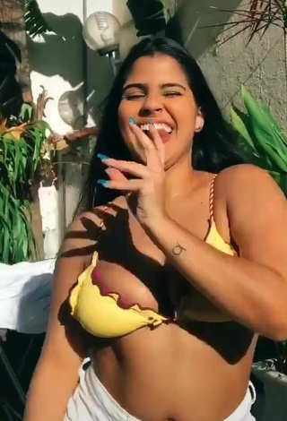 2. Titillating Julia Antunes Shows Cleavage in Yellow Bikini Top and Bouncing Breasts