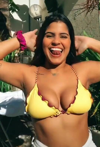 3. Titillating Julia Antunes Shows Cleavage in Yellow Bikini Top and Bouncing Breasts