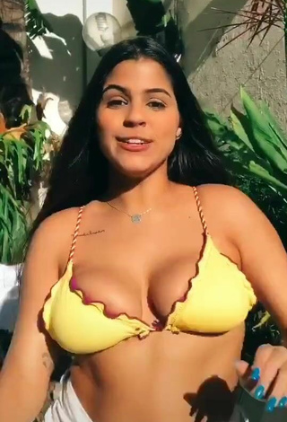 5. Titillating Julia Antunes Shows Cleavage in Yellow Bikini Top and Bouncing Breasts