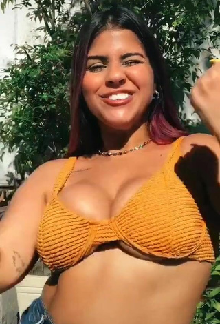 4. Hot Julia Antunes Shows Cleavage in Orange Bikini Top