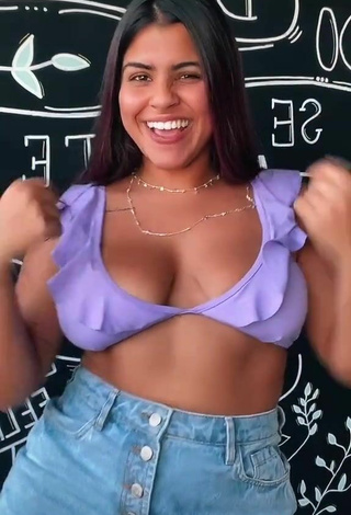 4. Hottie Julia Antunes Shows Cleavage in Purple Crop Top