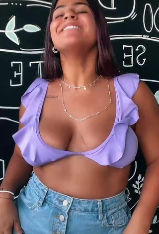 5. Hottie Julia Antunes Shows Cleavage in Purple Crop Top