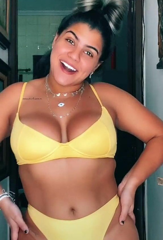 2. Breathtaking Julia Antunes Shows Cleavage in Yellow Bikini