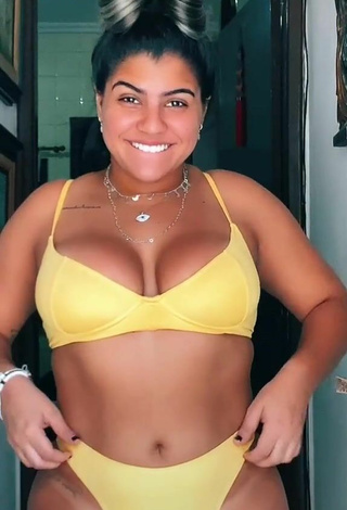 3. Breathtaking Julia Antunes Shows Cleavage in Yellow Bikini