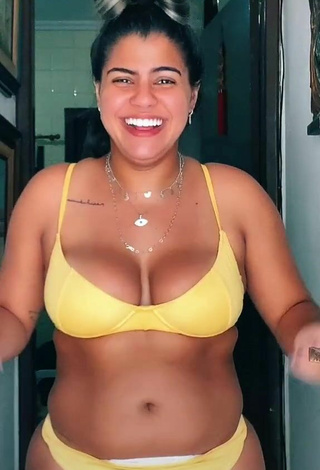 4. Breathtaking Julia Antunes Shows Cleavage in Yellow Bikini