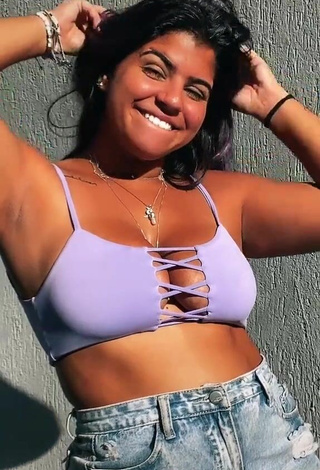 Cute Julia Antunes Shows Cleavage in Purple Crop Top