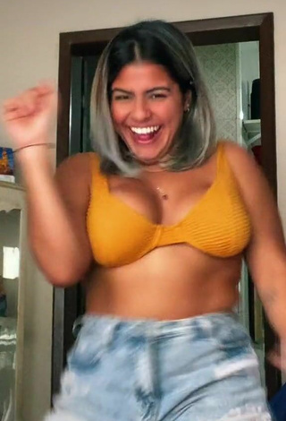 4. Julia Antunes Shows Cleavage in Sweet Yellow Bikini Top and Bouncing Breasts