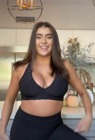 Sultry Kalani Hilliker Shows Cleavage in Black Crop Top