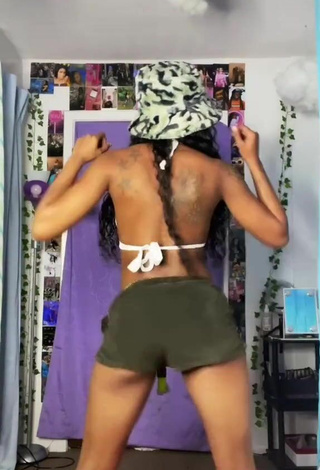 4. Titillating Kam Tunechi in White Bikini Top while Twerking