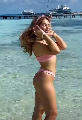 Hottie Michelle Kennelly in Pink Bikini at the Beach