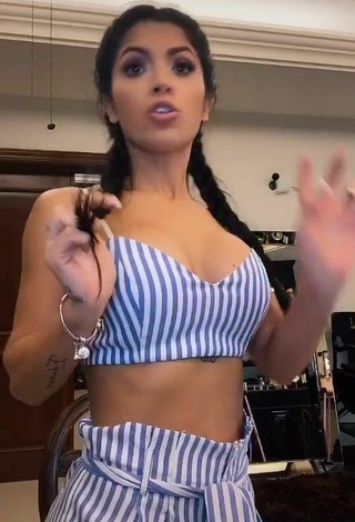 2. Sultry Kimberly Flores Shows Cleavage in Striped Crop Top