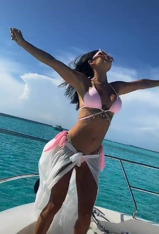 5. Sultry Kimberly Flores in Pink Bikini Top on a Boat