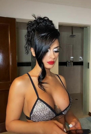 Amazing Kimberly Flores Shows Cleavage in Hot Silver Bikini Top