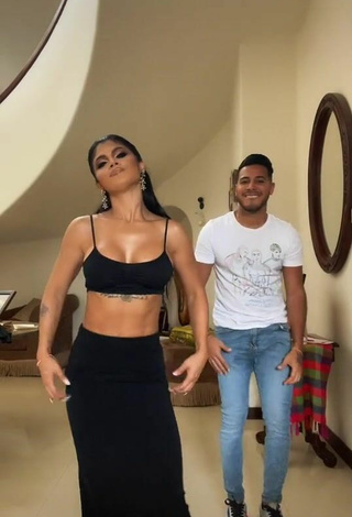 2. Pretty Kimberly Flores Shows Cleavage in Black Crop Top