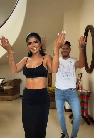 3. Pretty Kimberly Flores Shows Cleavage in Black Crop Top