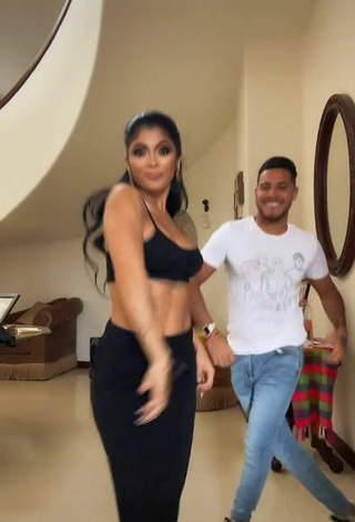 4. Pretty Kimberly Flores Shows Cleavage in Black Crop Top