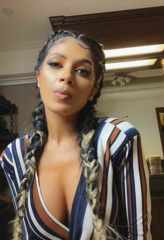 Sultry Kimberly Flores Shows Cleavage in Striped Overall