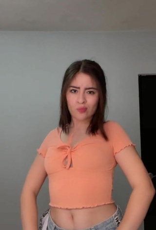 2. Luscious Kim Muñoz in Peach Crop Top