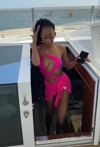 2. Sultry Lala Milan in Firefly Rose Swimsuit on a Boat