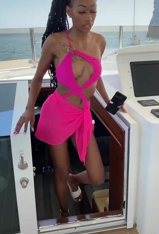 3. Sultry Lala Milan in Firefly Rose Swimsuit on a Boat