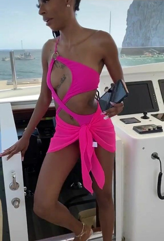 4. Sultry Lala Milan in Firefly Rose Swimsuit on a Boat