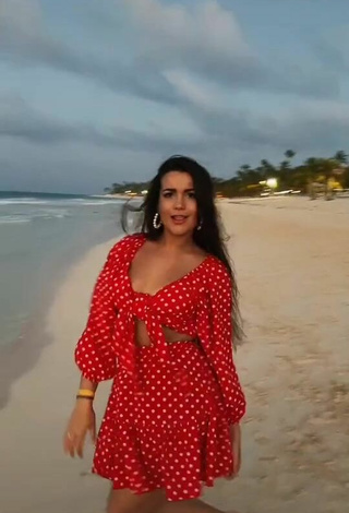 2. Sultry Lana in Polka Dot Sundress at the Beach