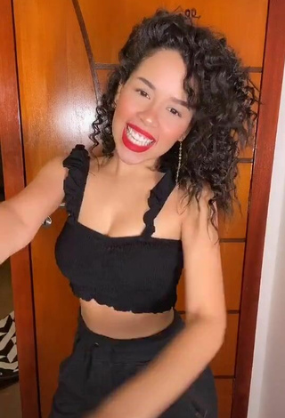 2. Luscious Laura Brito in Black Crop Top