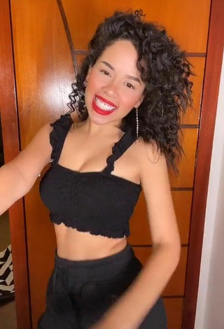 3. Luscious Laura Brito in Black Crop Top