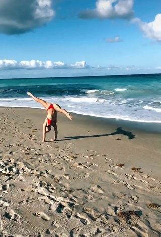 2. Erotic Olivia Dunne in Red Bikini at the Beach