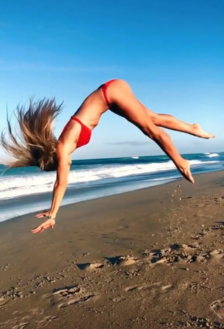 3. Sweet Olivia Dunne in Cute Red Bikini at the Beach while doing Fitness Exercises