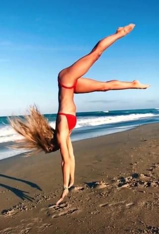 4. Sweet Olivia Dunne in Cute Red Bikini at the Beach while doing Fitness Exercises