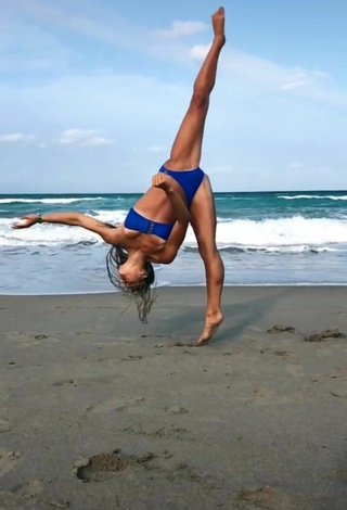 4. Beautiful Olivia Dunne in Sexy Blue Bikini at the Beach while doing Fitness Exercises