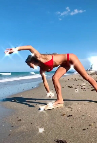 2. Titillating Olivia Dunne in Red Bikini at the Beach