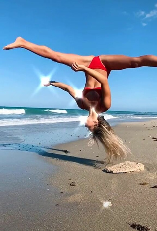 4. Titillating Olivia Dunne in Red Bikini at the Beach