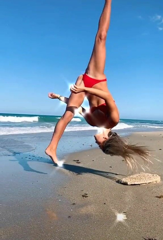 5. Titillating Olivia Dunne in Red Bikini at the Beach