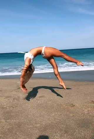 4. Hottie Olivia Dunne in White Bikini at the Beach