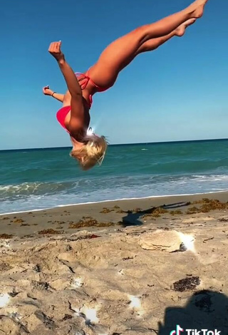 4. Cute Olivia Dunne in Red Bikini at the Beach while doing Fitness Exercises