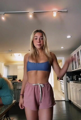 Sultry Olivia Dunne in Blue Crop Top