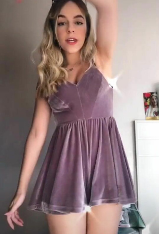 Titillating Lorella Verta in Violet Dress