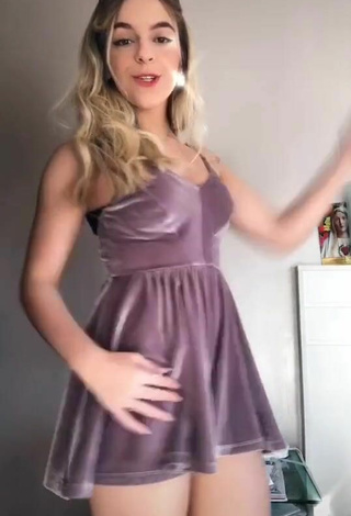 2. Titillating Lorella Verta in Violet Dress