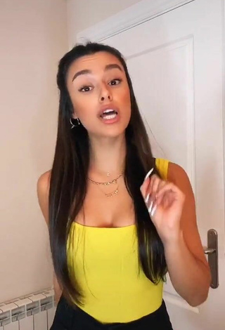 3. Sultry Marta Díaz in Yellow Top