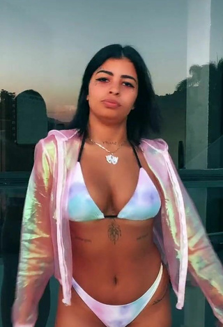 Sultry MC Lya Shows Cleavage in Bikini and Bouncing Tits