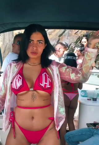 2. Titillating MC Lya Shows Cleavage in Red Bikini (Underboob)