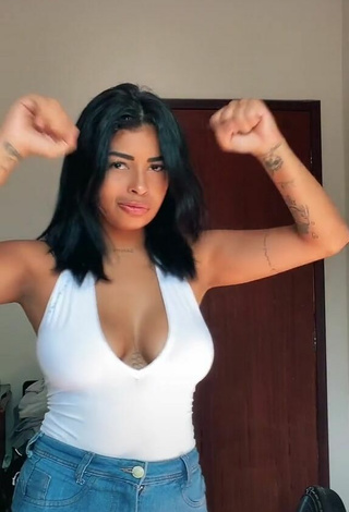 2. Luscious MC Lya Shows Cleavage in White Top