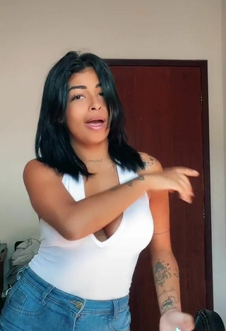 3. Luscious MC Lya Shows Cleavage in White Top