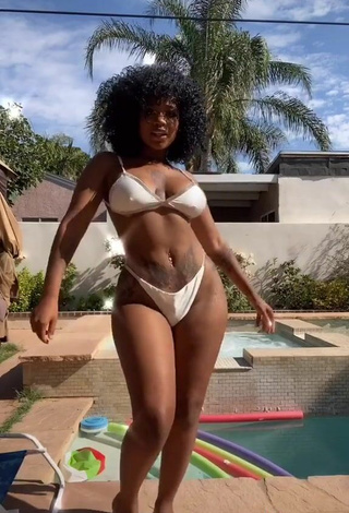 Titillating Mikeila Jones in White Bikini at the Swimming Pool