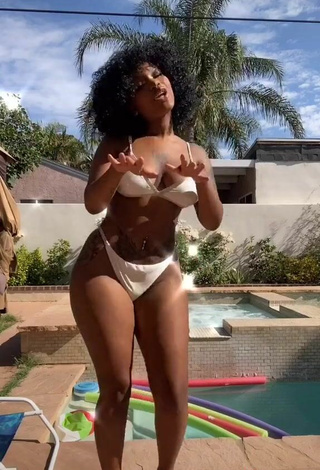 5. Titillating Mikeila Jones in White Bikini at the Swimming Pool