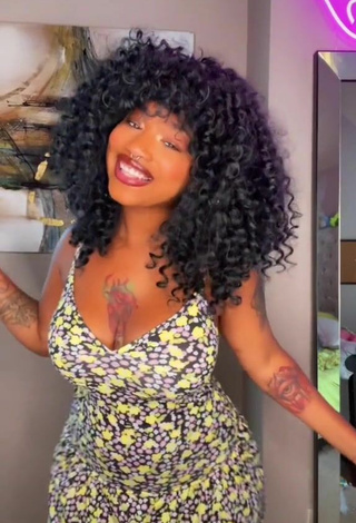 Sultry Mikeila Jones Shows Cleavage in Floral Sundress